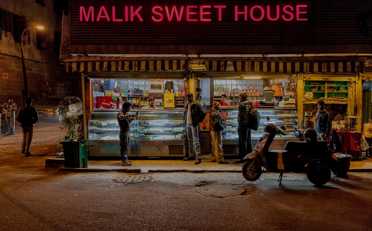 Malik Sweet House - Slide 1